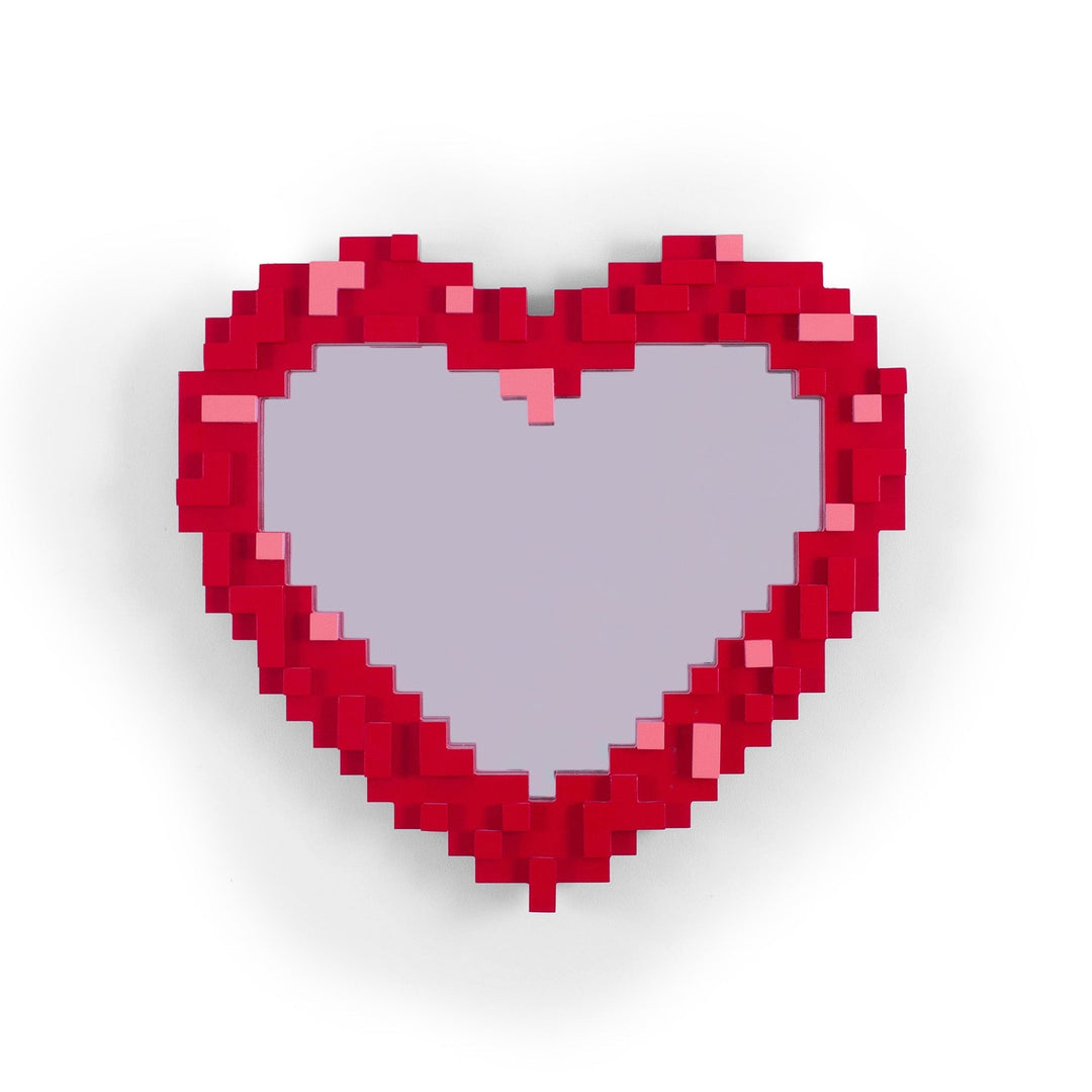 Pixelated heart-shaped mirror with bold red acrylic frame by designer Bruno