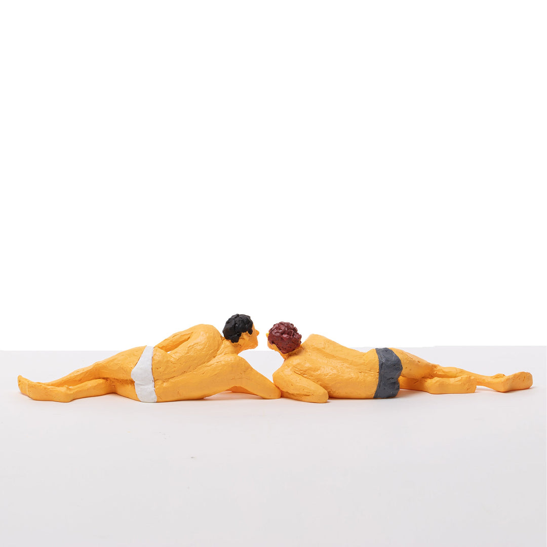 Seletti Love Is a Verb Tom &amp; Nick Figurine, low side view of the pair stretched out head to head