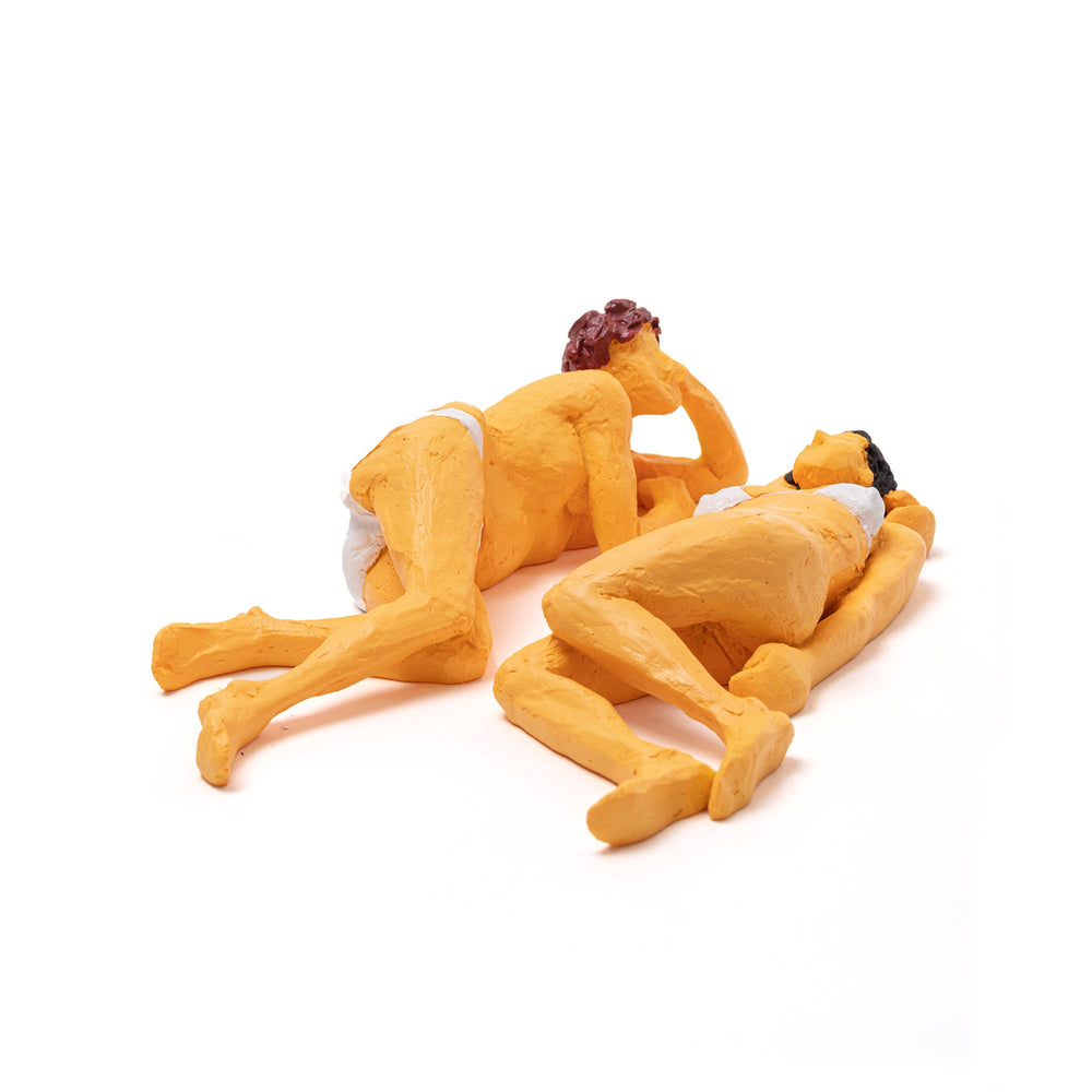 Seletti Love Is a Verb Maya & Sofia Figurine, the pair of reclining figures from a low angle