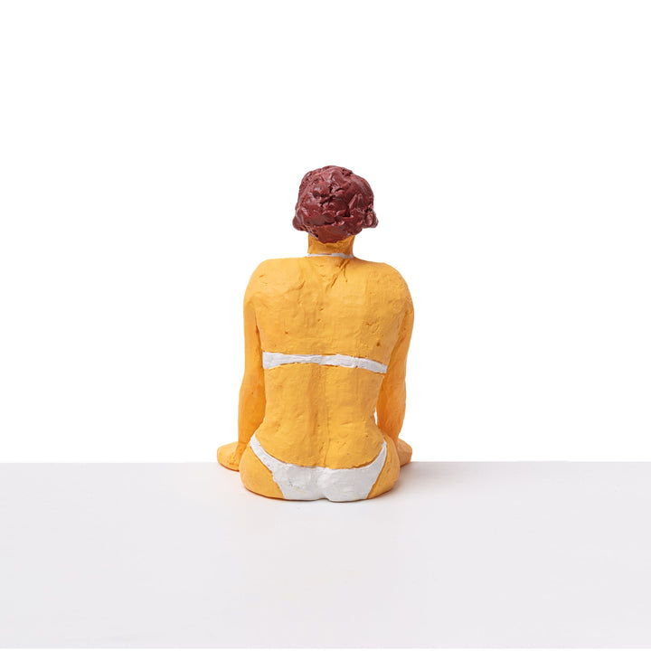 Seletti Love Is a Verb Tanya Figurine, back view of the figure with curly auburn hair