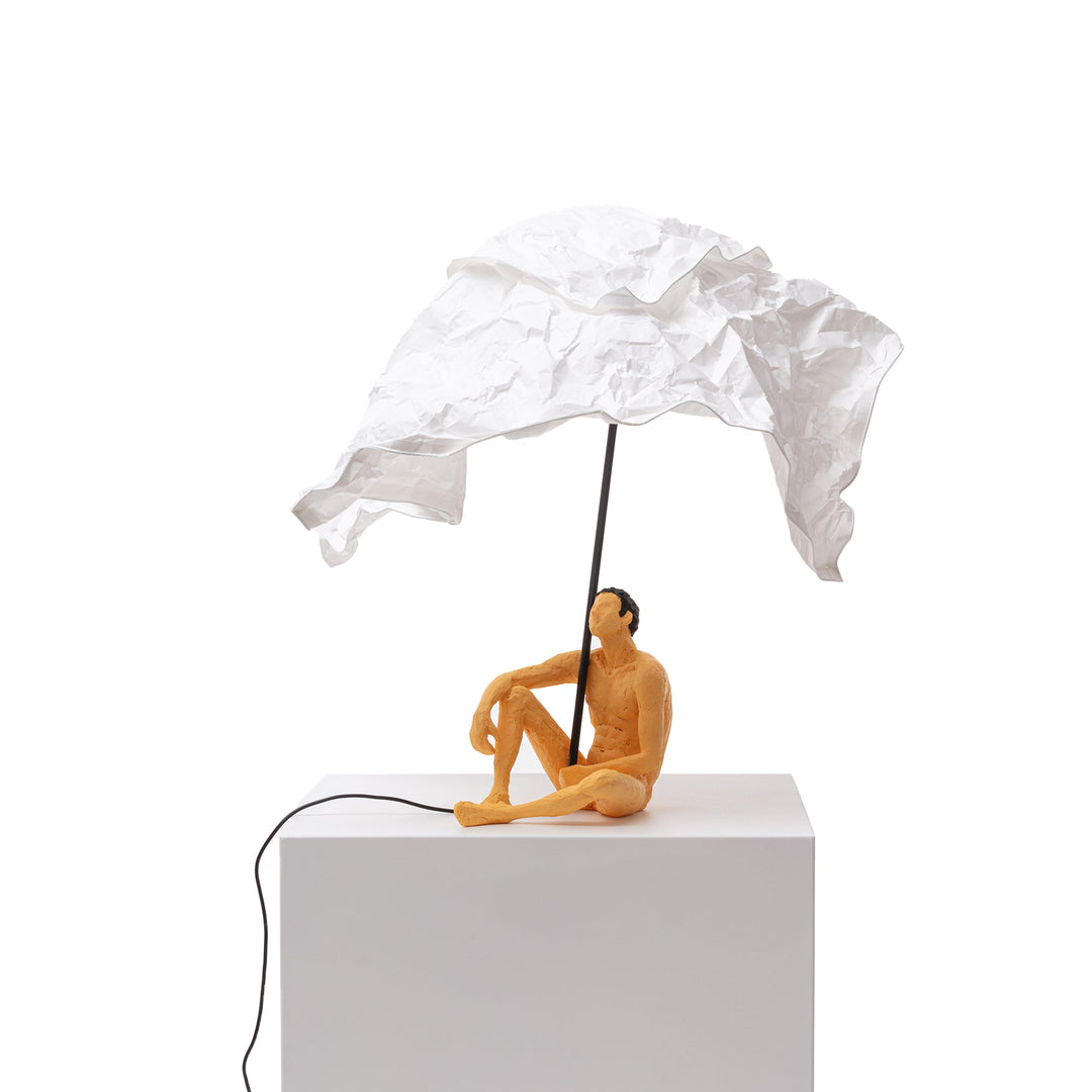 Seletti Love Is a Verb Lamp Roby, the lamp from behind the figure, unlit