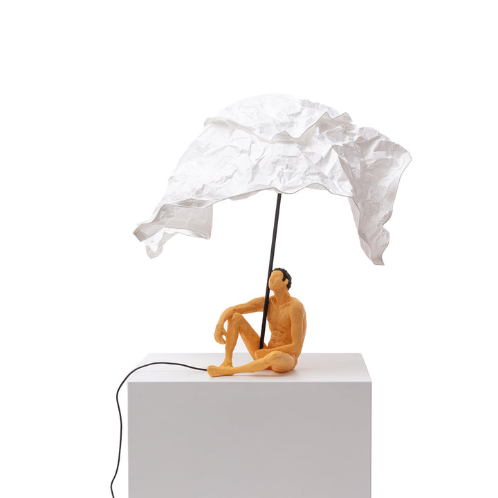 Seletti Love Is a Verb Lamp Roby, the lamp from behind the figure, unlit