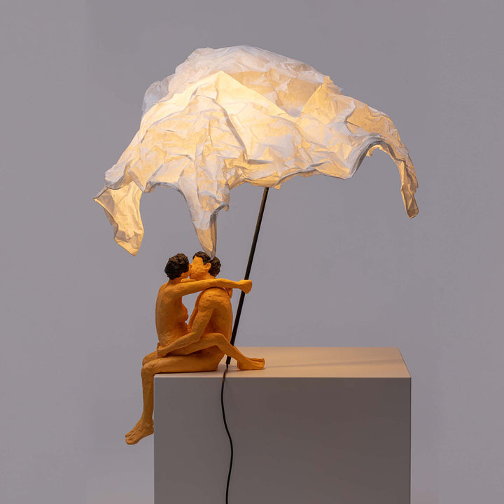 Seletti Love Is a Verb Lamp Max &amp; Roberta, lit shade from a low angle against gray