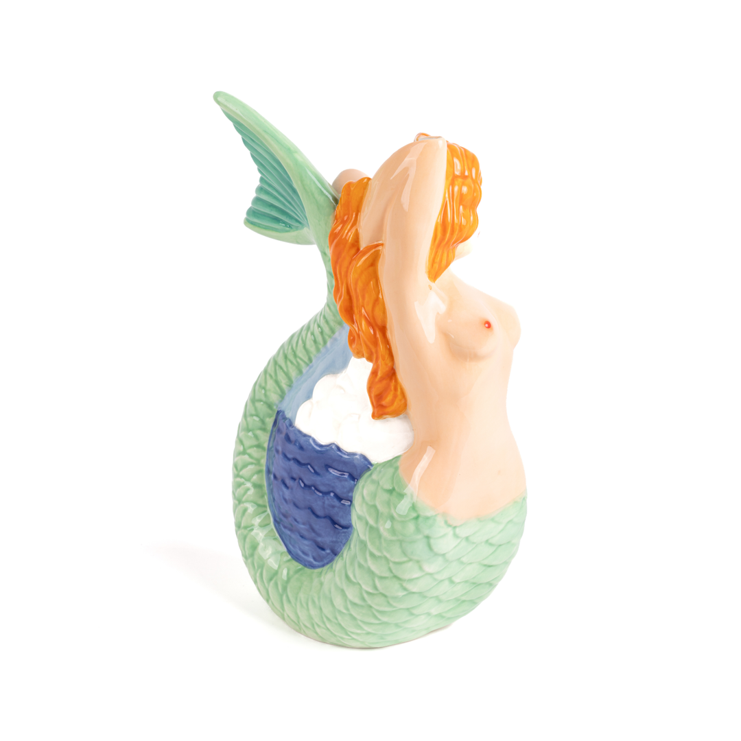 Seletti Mermaid Ceramic Pitcher, three-quarter view of the mermaid with arms raised behind her head