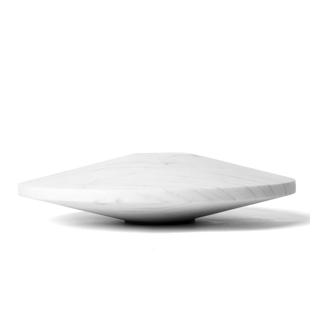 Seletti Lvdis Marble Weight Disk, low side view of the disk's tapered edge