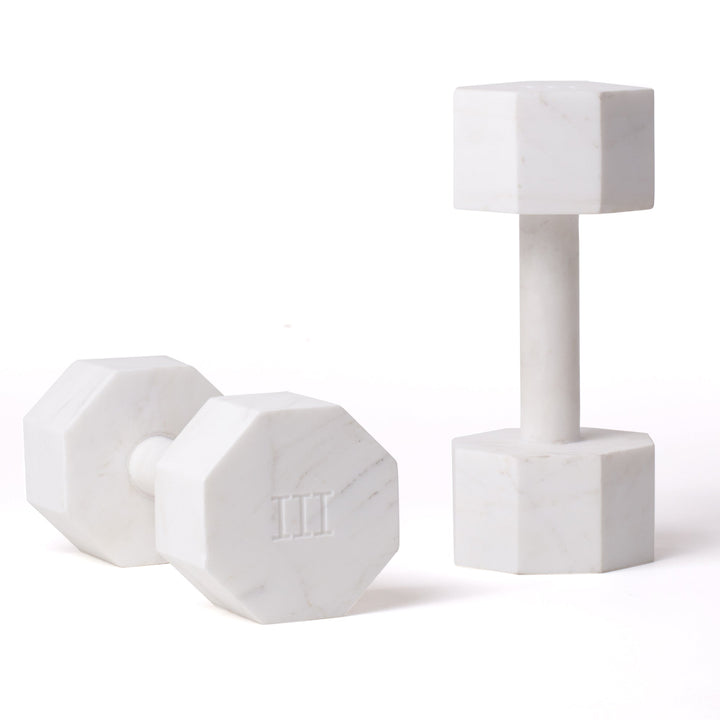 Seletti Lvdis Marble Dumbbells 3 kg (Set of 2), pair of white marble dumbbells, one upright and one on its side