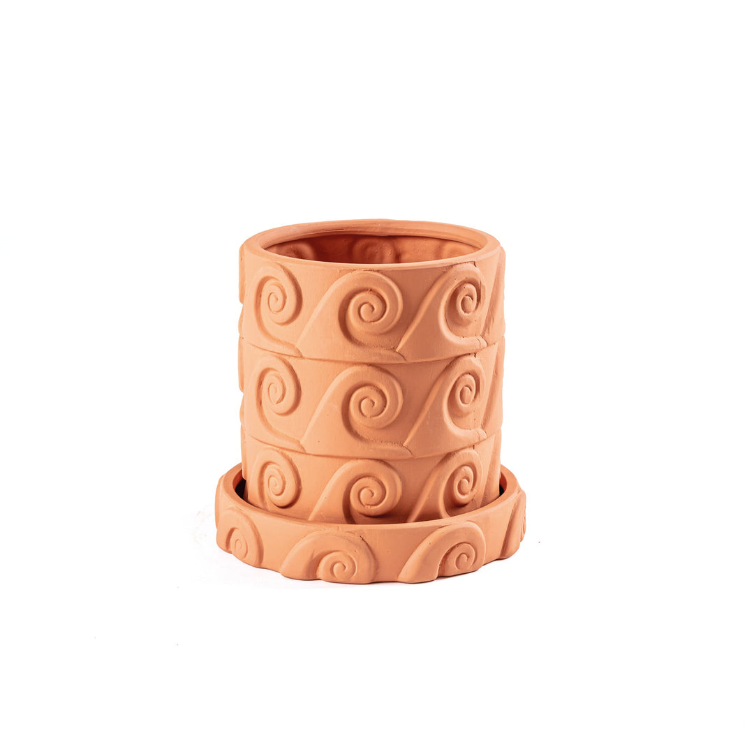 Seletti Magna Graecia Terracotta Vase Onda, small terracotta pot carved with wave spirals, on its saucer