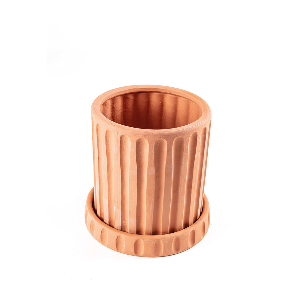 Seletti Magna Graecia Terracotta Vase Dorico, angled view into the fluted pot and saucer