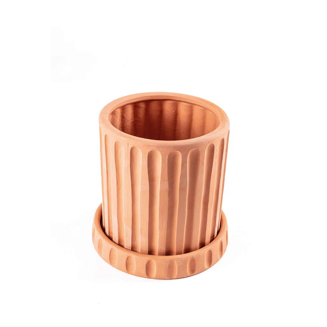 Seletti Magna Graecia Terracotta Vase Dorico, angled view into the fluted pot and saucer