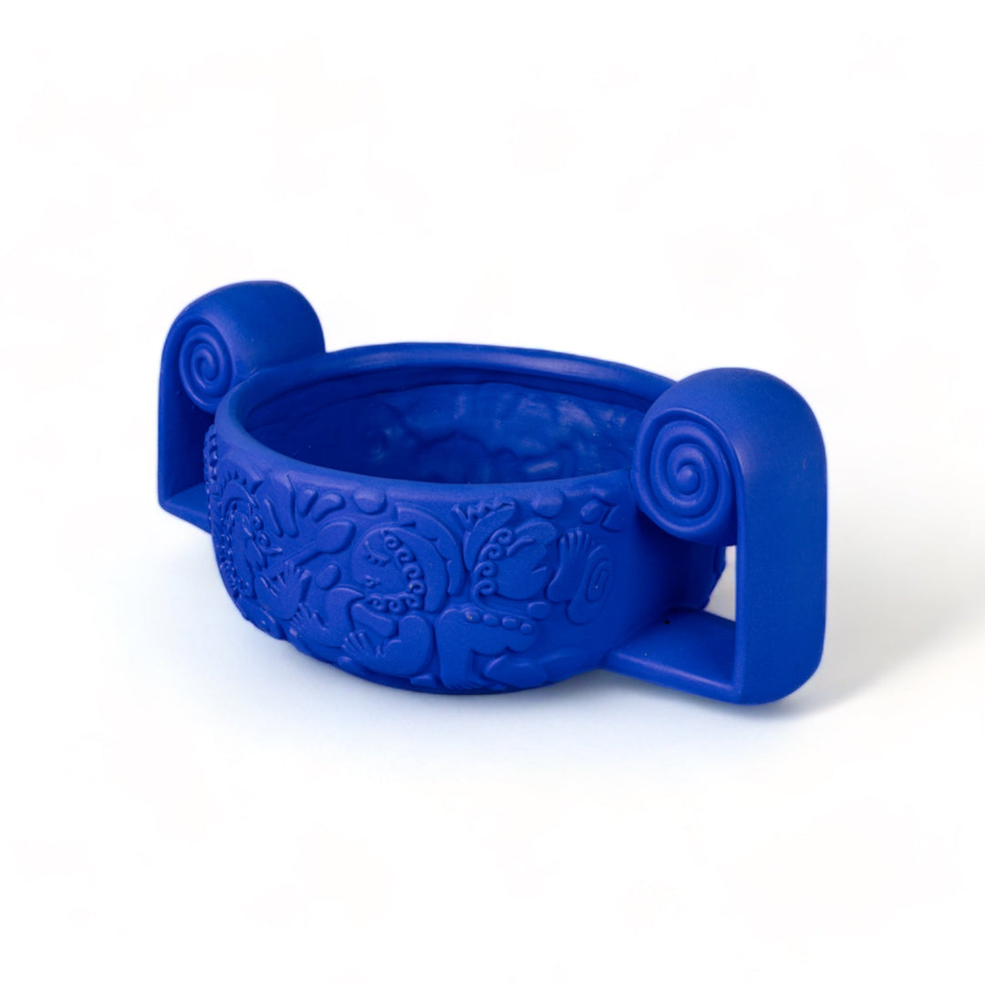 Seletti Magna Graecia Terracotta Centerpiece Blue, the centerpiece from the end, showing a scroll handle