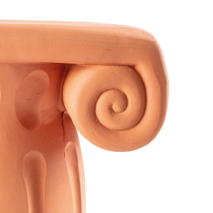 Seletti Magna Graecia Terracotta Capitello Stool, close-up of a carved spiral volute