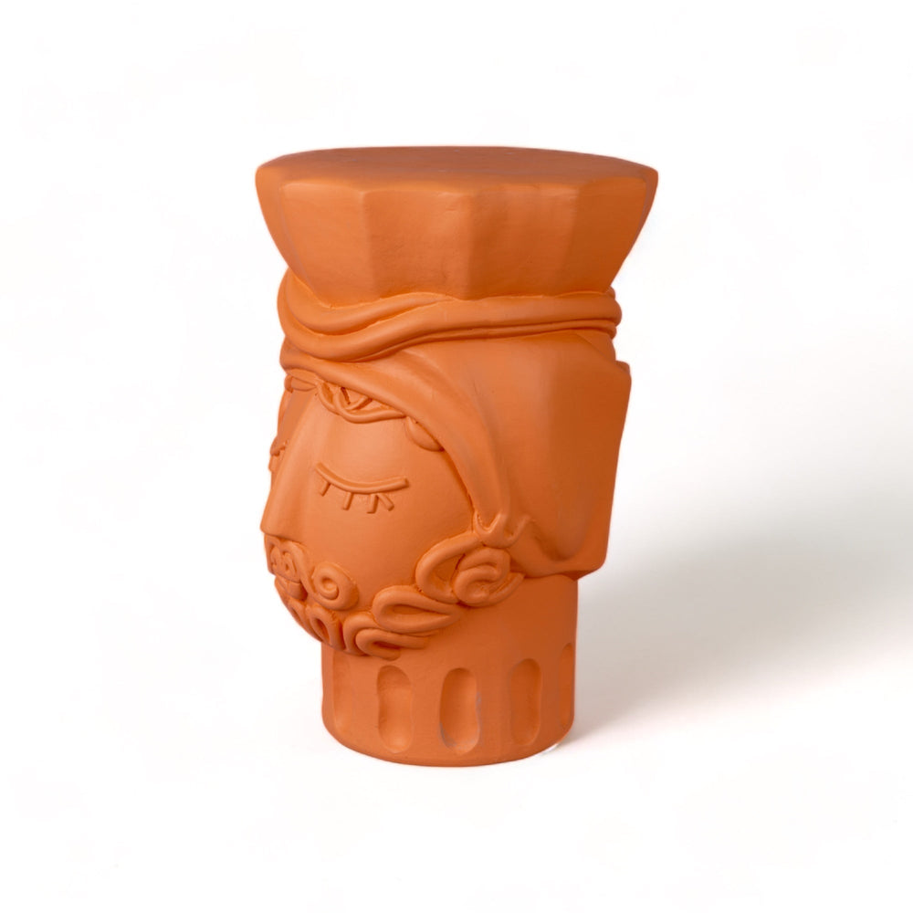 Seletti Magna Graecia Terracotta Stool Man, three-quarter view of the head stool and carved earring