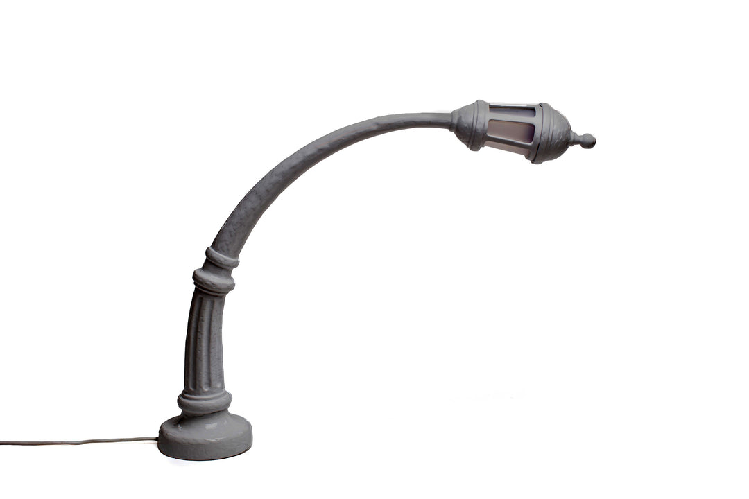 Seletti Sidonia Desk Lamp Gray, dark gray resin desk lamp shaped like a curved street lamp with a lantern head