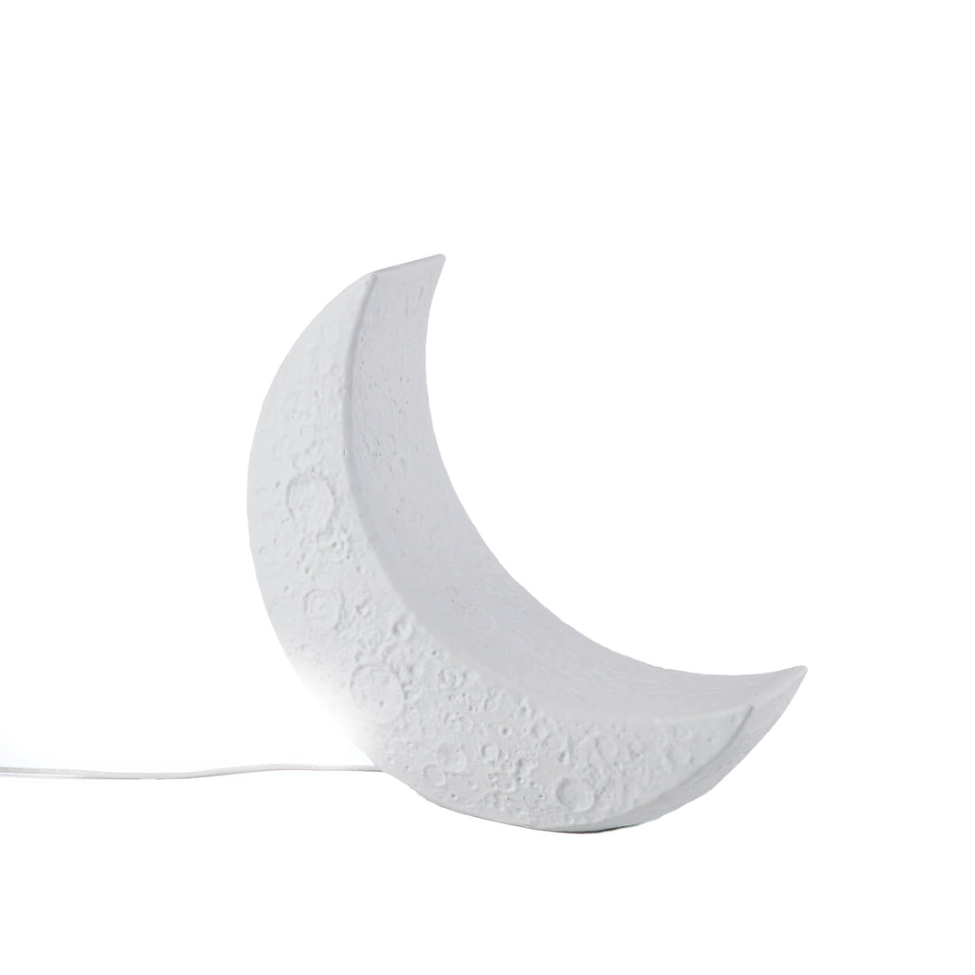 Seletti My Tiny Moon Lamp, white porcelain crescent moon lamp with a cratered surface, unlit