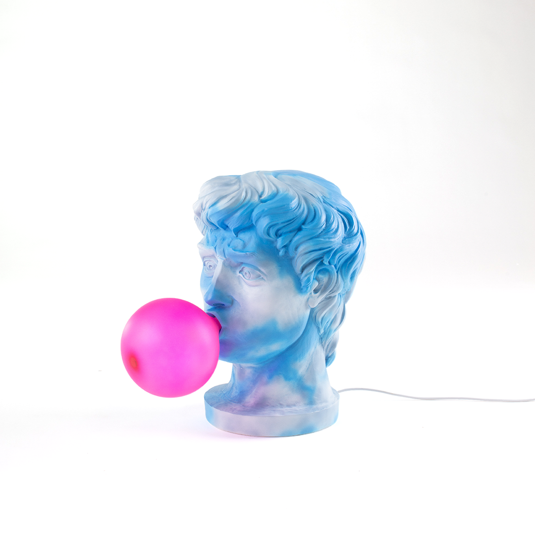 Seletti Wonder Cloud Bust Lamp, three-quarter view with the pink bubble at the lips