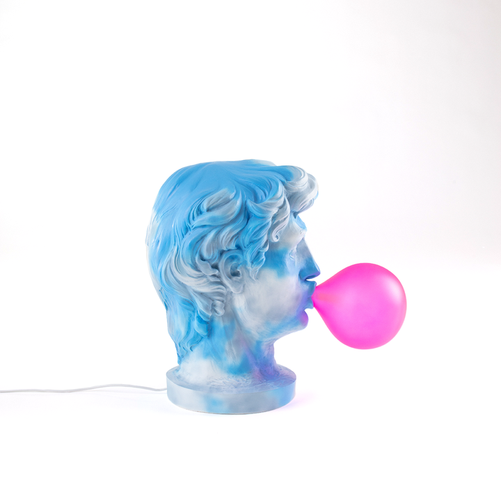 Seletti Wonder Cloud Bust Lamp, right profile of the bust blowing the pink bubble