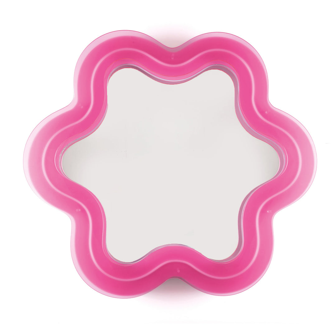 Seletti Supercurve Wavy Mirror Flower, flower-shaped mirror framed in glowing hot pink plexiglass