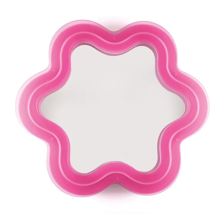 Seletti Supercurve Wavy Mirror Flower, flower-shaped mirror framed in glowing hot pink plexiglass