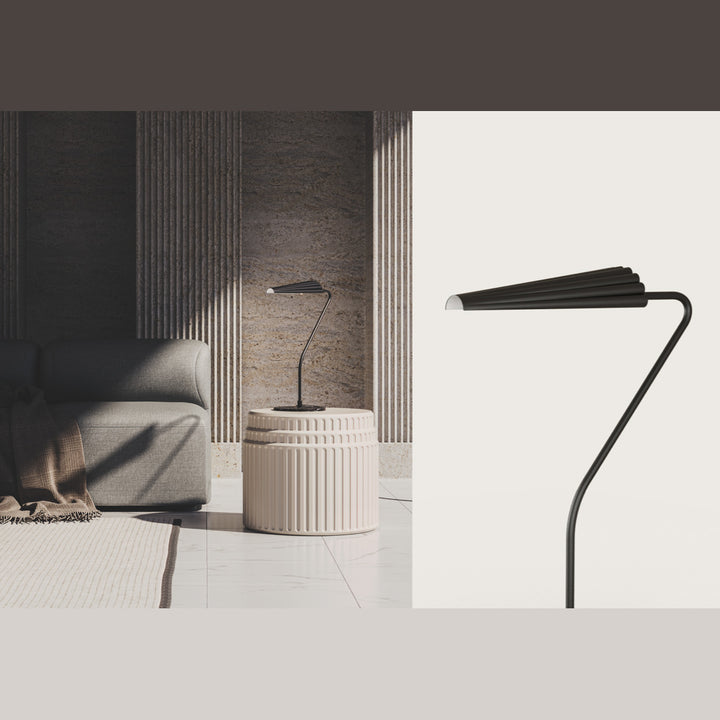 Bion Table Lamp in black on a fluted side table beside a grey sofa, with a close-up of the shade