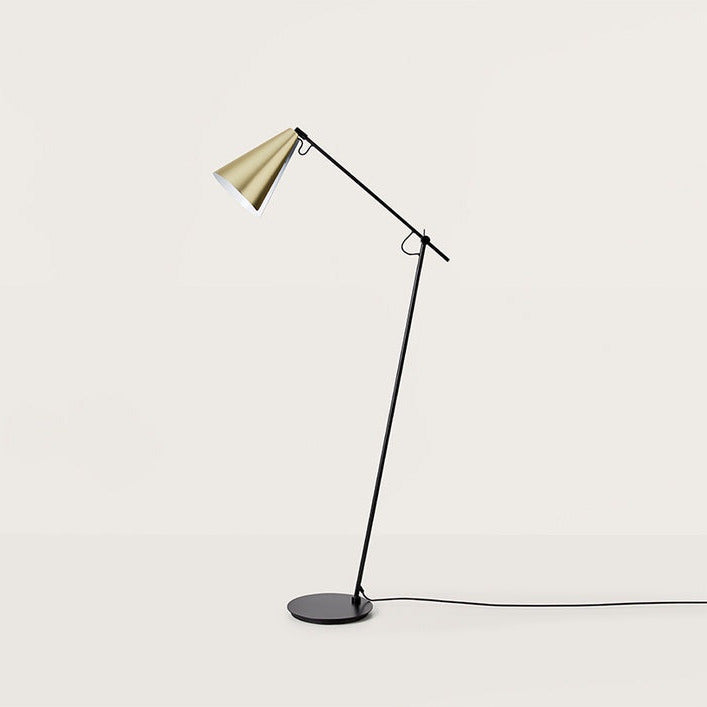 Boa Floor Lamp with matt brass shade, full side view on a pale backdrop