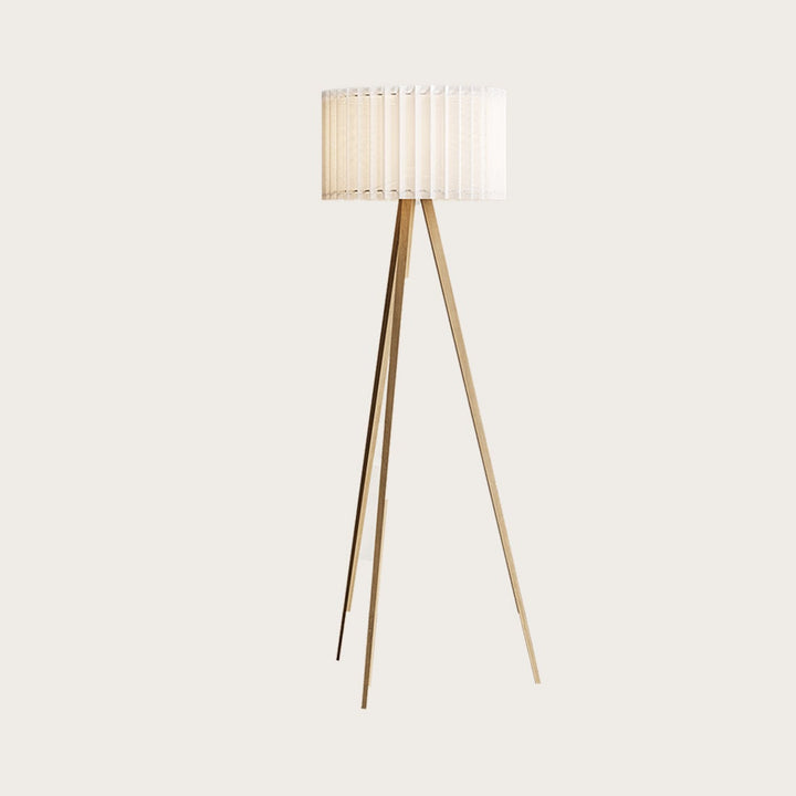 Dira Floor Lamp, a tripod with pine-effect steel legs and a white pleated paper drum shade, by Aromas del Campo