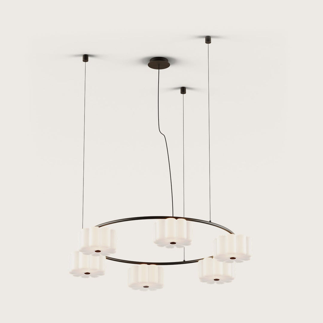 Flow Chandelier, a dark metal ring with six scalloped opal glass shades on cables, unlit, by Aromas del Campo