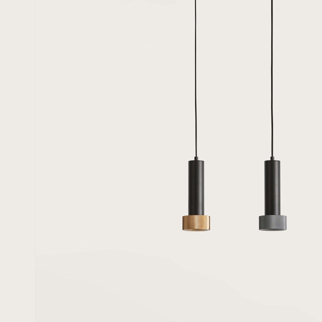 Focus Pendant Lamp, two matt black cylinder pendants with gold and anthracite heads by Aromas del Campo