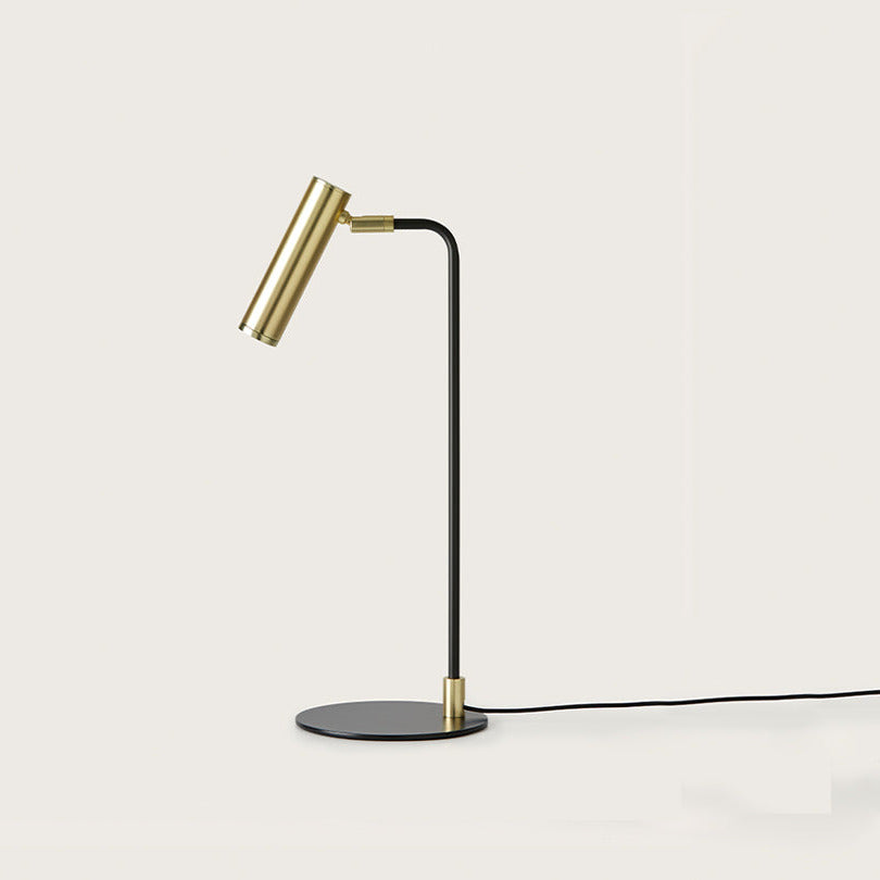 Maru Table Lamp with brass cylinder head, slim black stem and round black base, unlit, by Aromas del Campo