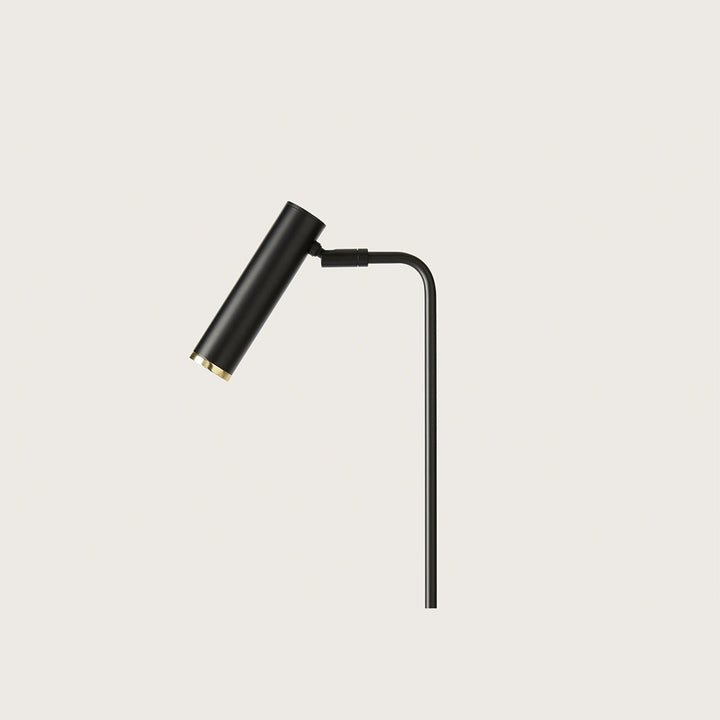Maru Table Lamp close-up of the matt black cylinder head with brass rim