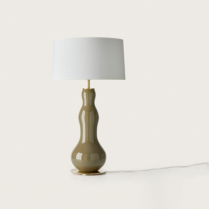 Melly Table Lamp, olive glass gourd-shaped base with brass disc foot and white drum shade, by Aromas del Campo