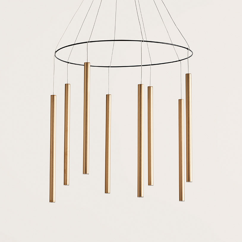 Mika Chandelier close-up of bronze tubes suspended from the black ring