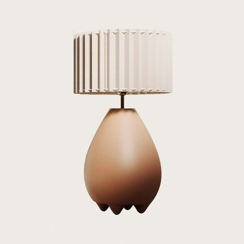 Obrie Table Lamp with teardrop terracotta ceramic base and pleated cream fabric shade, unlit, by Aromas del Campo
