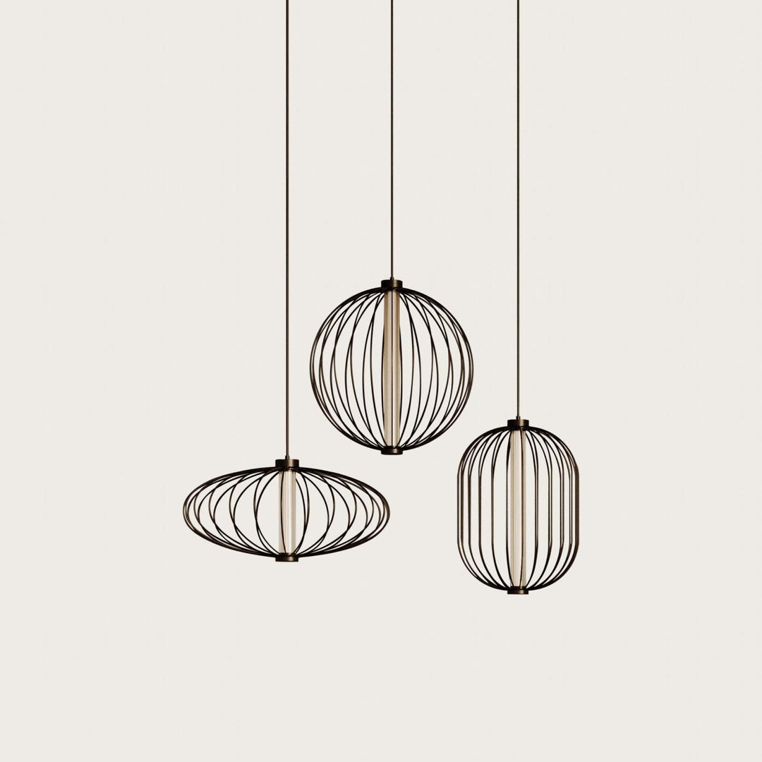 Pepo 40 Pendant Lamp family, three dark wire-rod cage pendants with glowing central diffusers, by Aromas del Campo