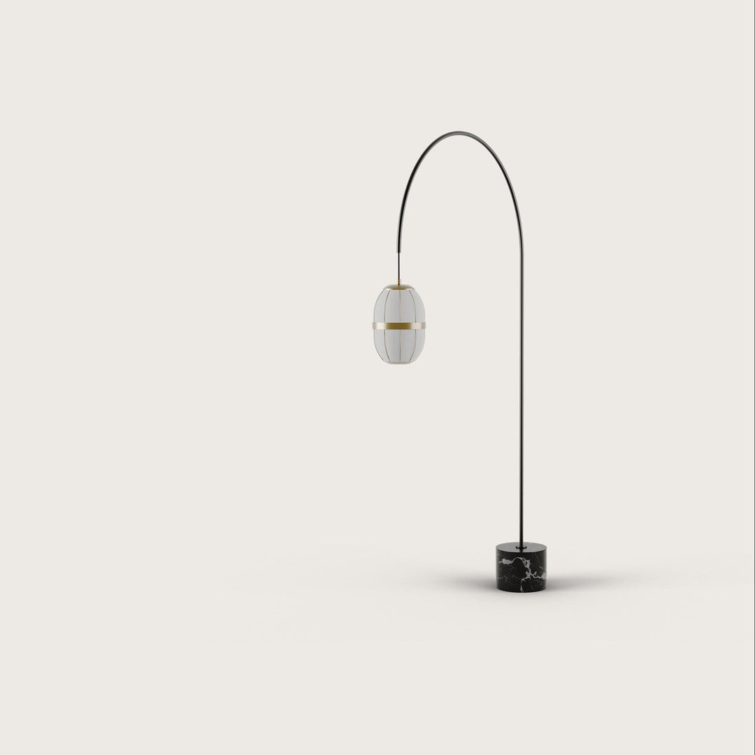 Pull Floor Lamp, black arched arm with an oval linen lantern shade on a black marble base, by Aromas del Campo