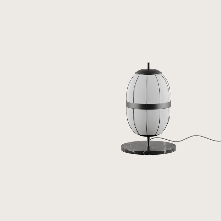 Pull Table Lamp, white linen lantern shade with black metal ribs and band on a black marble base, by Aromas del Campo