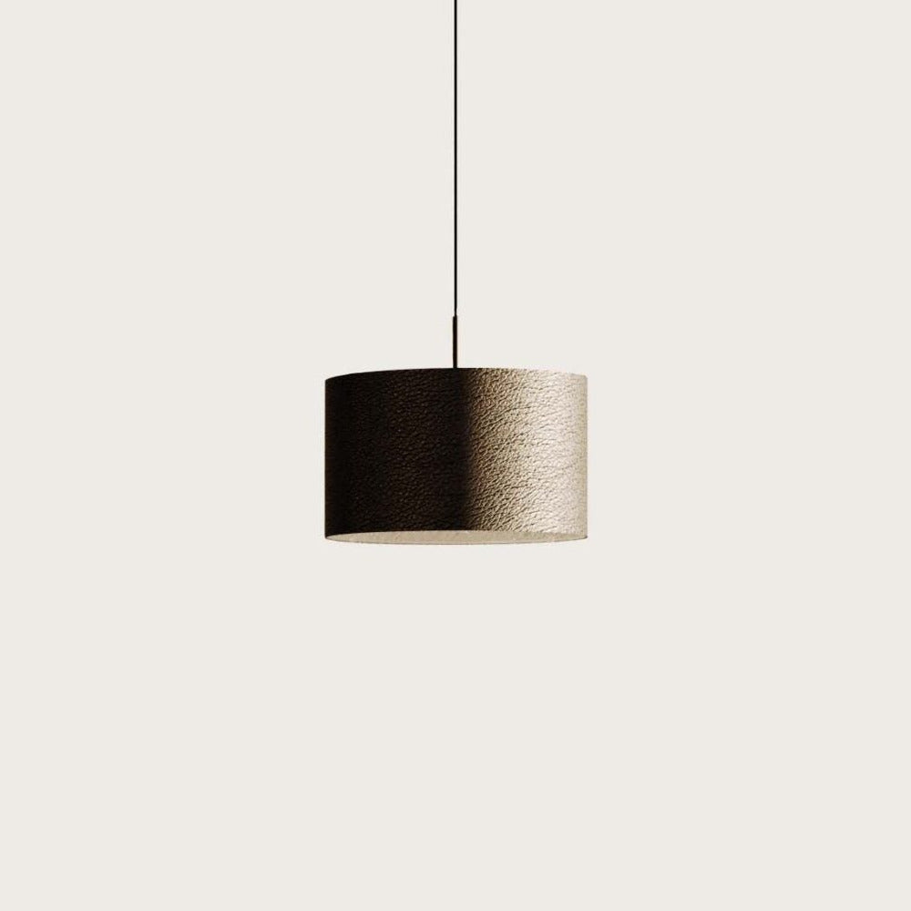 Rems Pendant, textured black leather drum shade on a thin black stem, unlit, by Aromas del Campo