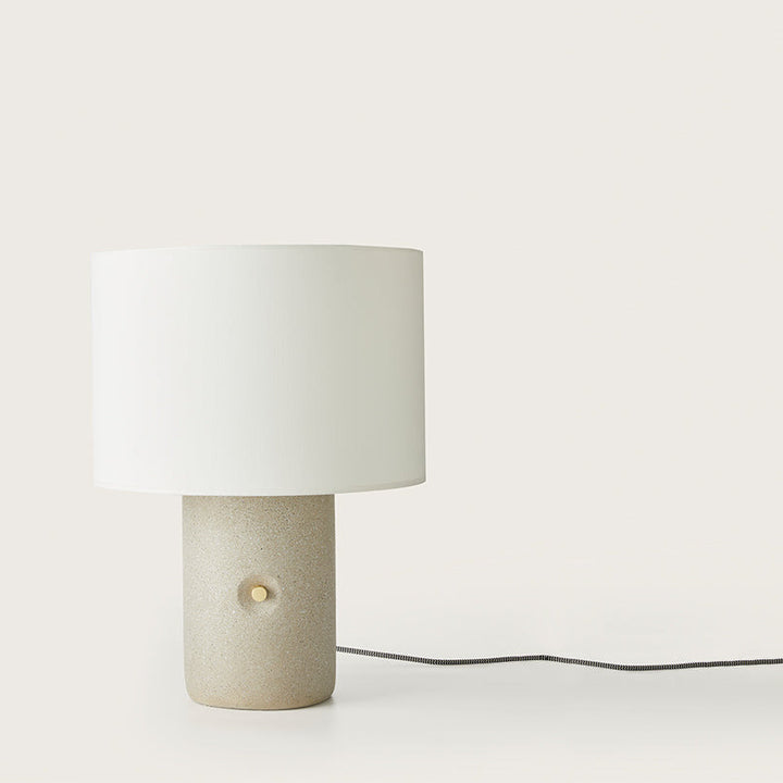 Sand Table Lamp with speckled grey terrazzo cylinder base, brass dimmer knob and white drum shade, by Aromas del Campo