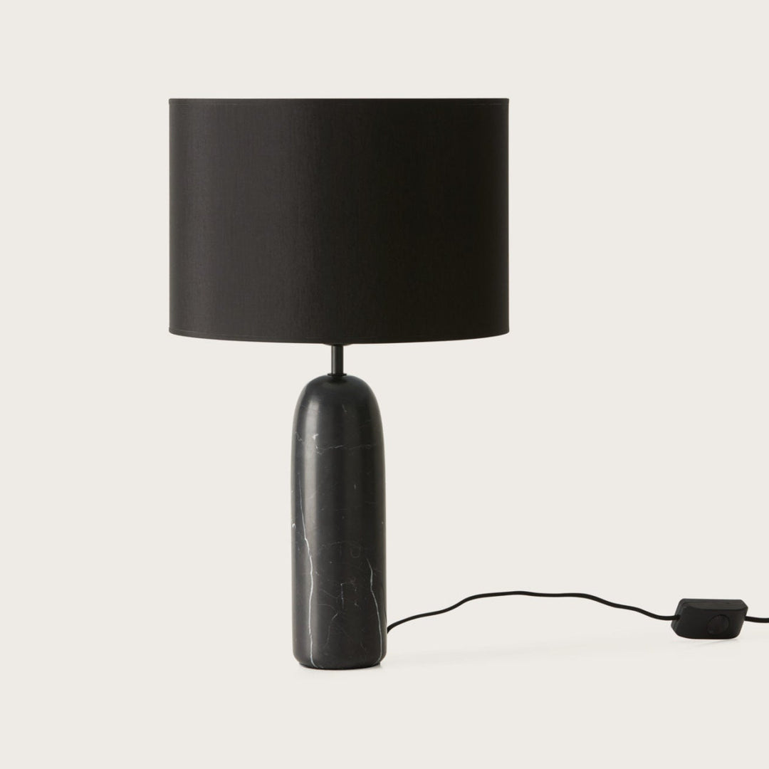 Shin Table Lamp, rounded black marble column base with black fabric drum shade, by Aromas del Campo