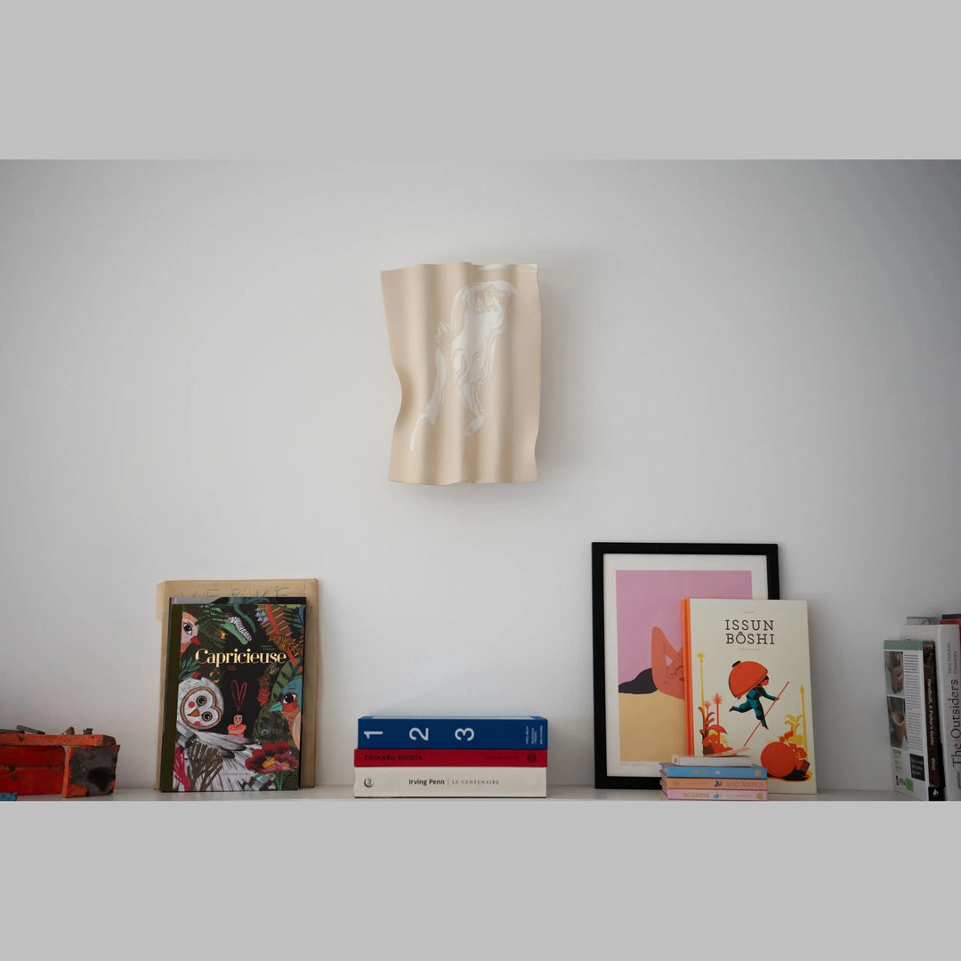Drape Ceramic &amp; Brass Wall Light — Glaze Highlight — lifestyle shot above a styled shelf