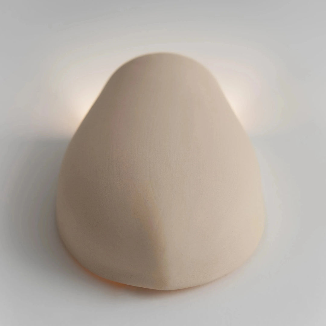 Sanctuary I Ceramic Wall Sconce — White Stoneware, angled overhead detail of the rounded form
