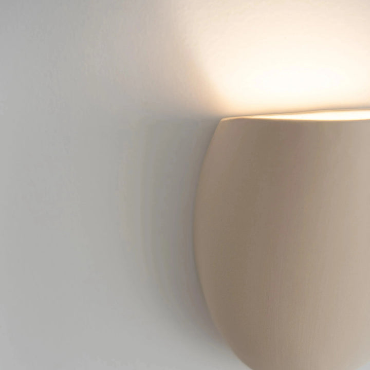 Sanctuary I Ceramic Wall Sconce — White Stoneware, side profile detail showing the curved silhouette