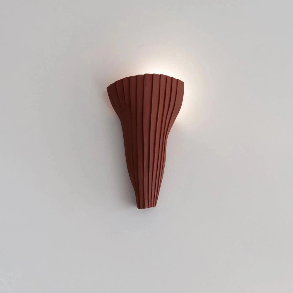 Tenderness Ceramic Wall Sconce — Crimson Stoneware, full front view, illuminated