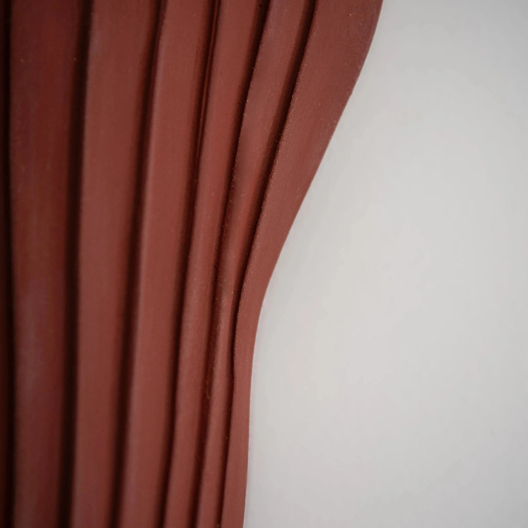 Tenderness Ceramic Wall Sconce — Crimson Stoneware, detail of ribbed edge and curved silhouette