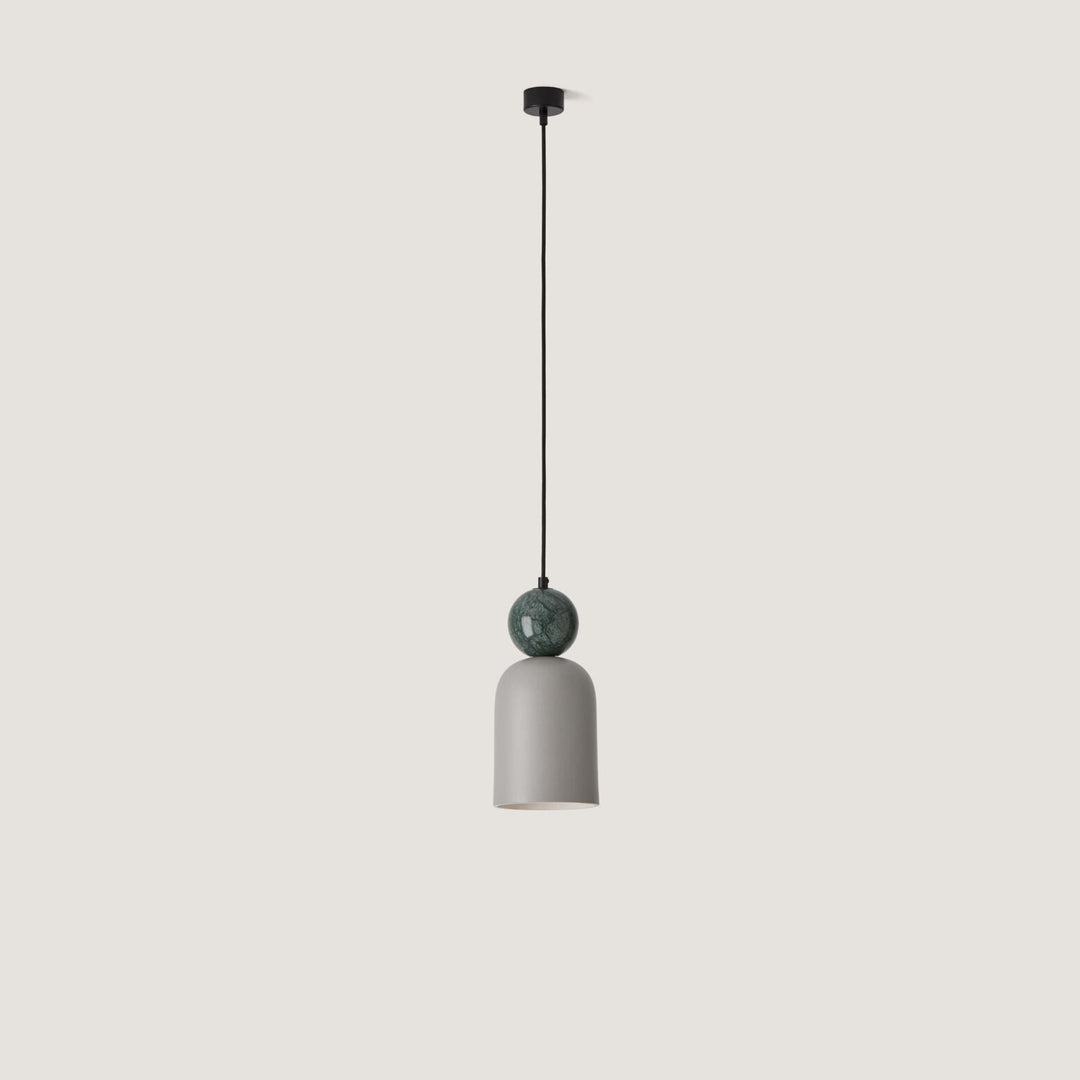 Minimalist pendant light on a plain background