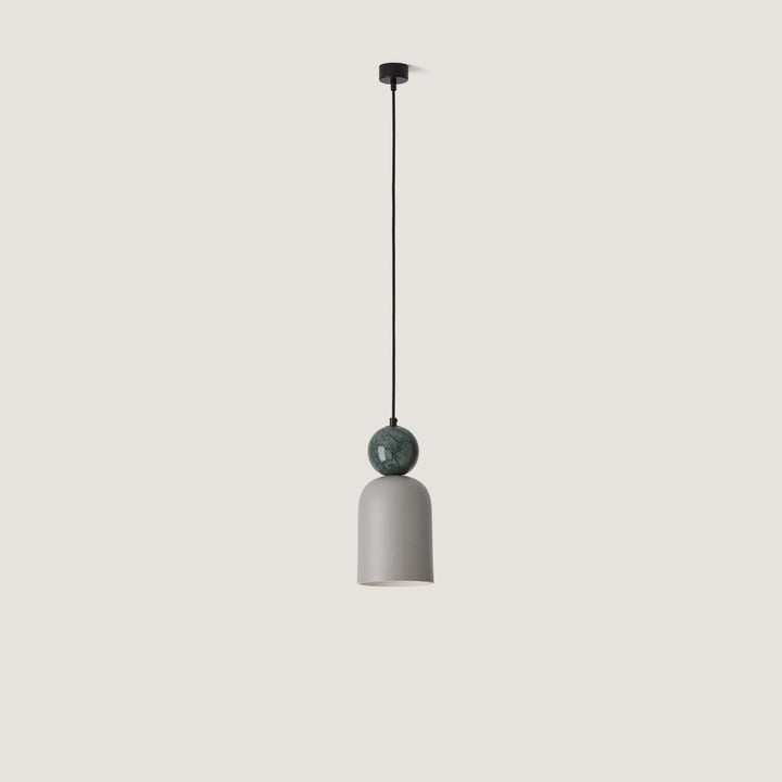 Minimalist pendant light on a plain background