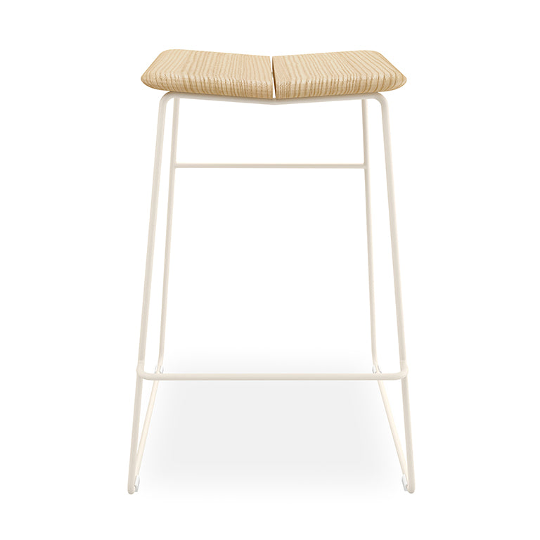 Woven rattan bar stool with minimalist white metal frame, designer home furnishing