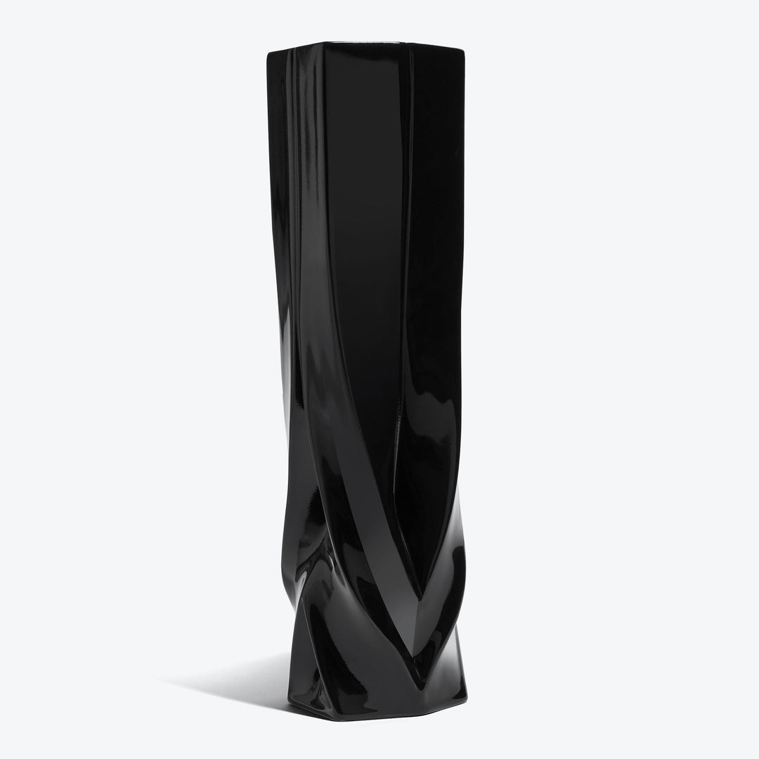 Braid Vase — Tall black porcelain vase, three-quarter view on a white background