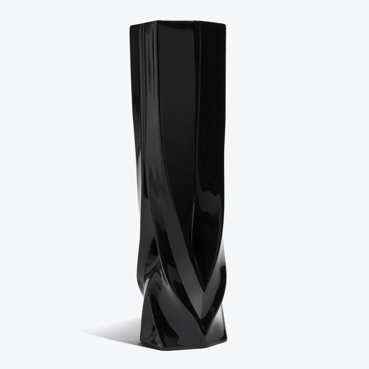 Braid Vase — Tall black porcelain vase, three-quarter view on a white background