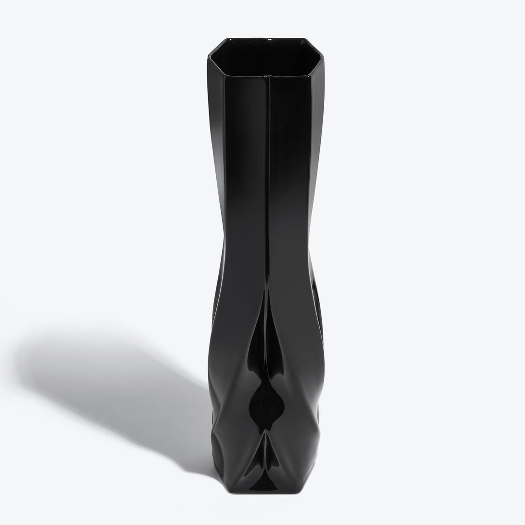 Braid Vase — Tall black porcelain vase from a slightly raised angle showing its hexagonal opening