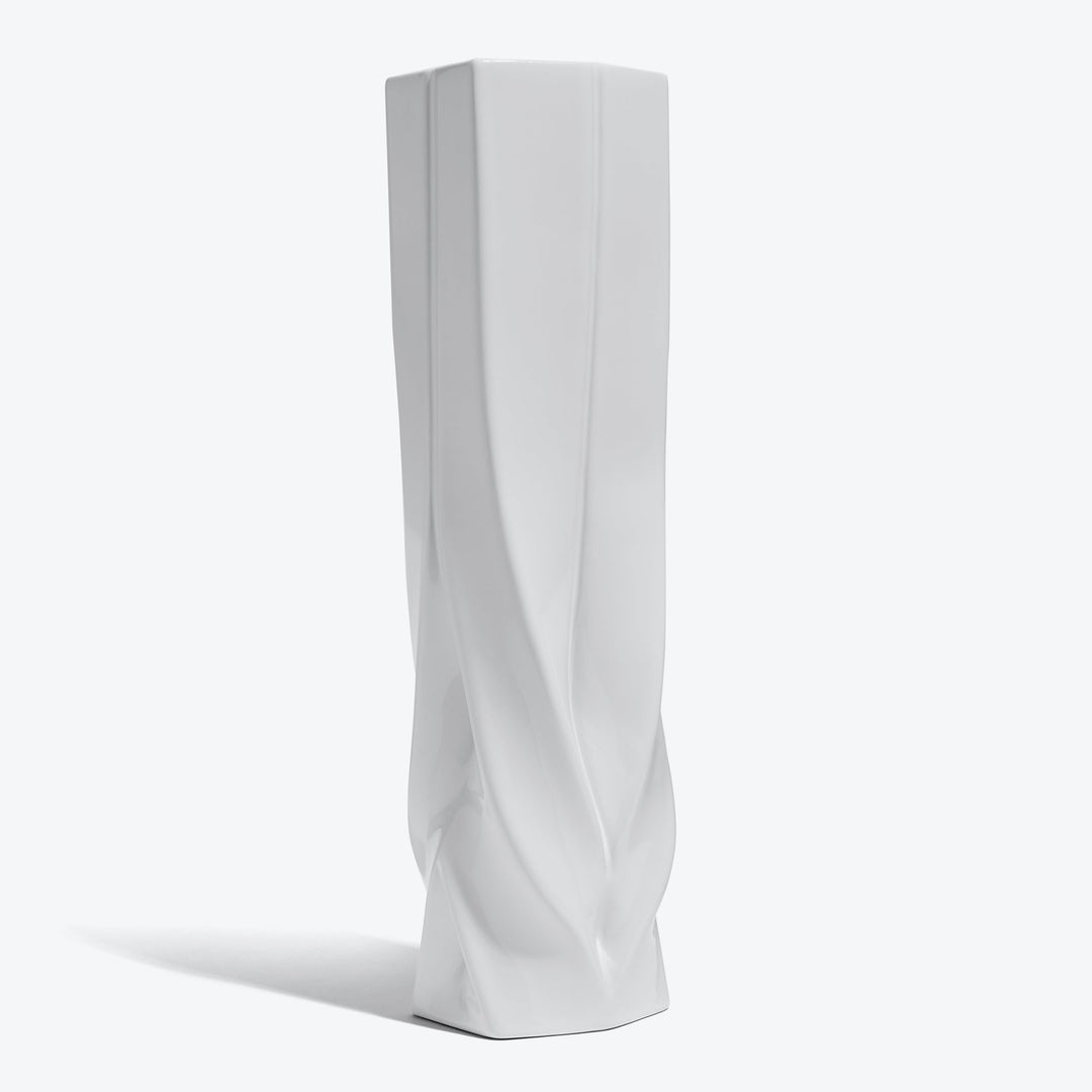 Braid Vase — Tall white porcelain vase, three-quarter view on a white background